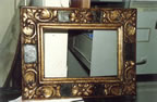Gilding repair to mirror before and after; 